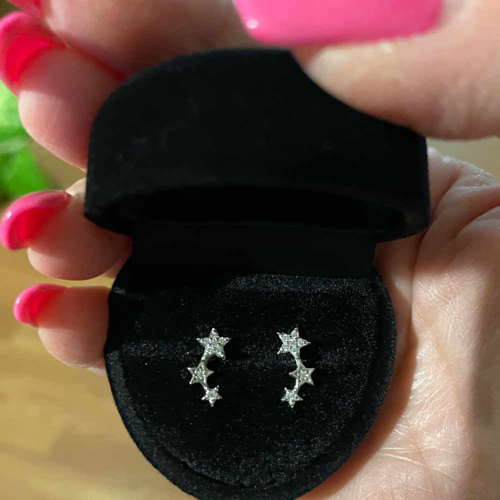 Really cute 3 star sterling silver earrings with small  cubic zirconia stones 💫